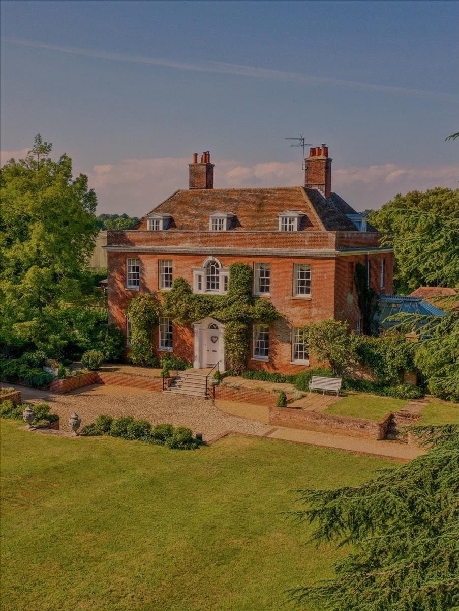 A Georgian country house in its gardens
